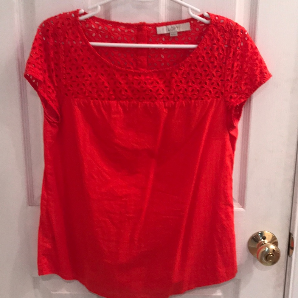 Bright orange top